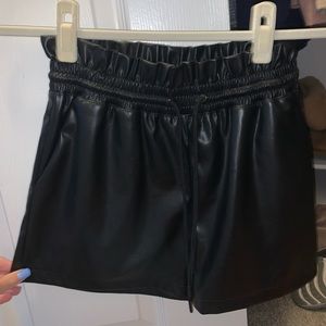 Black leather shorts